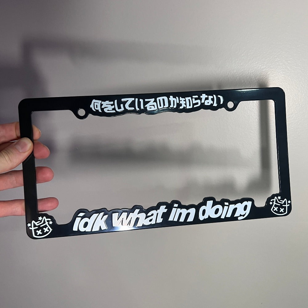 dizzy kitty - idk what i'm doing - license plate frame (black/white text) - triple cat deluxe