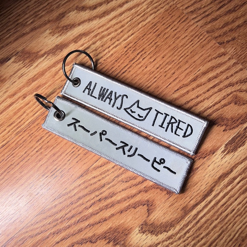 always tired ~ REFLECTIVE (flight tag) - triple cat deluxe