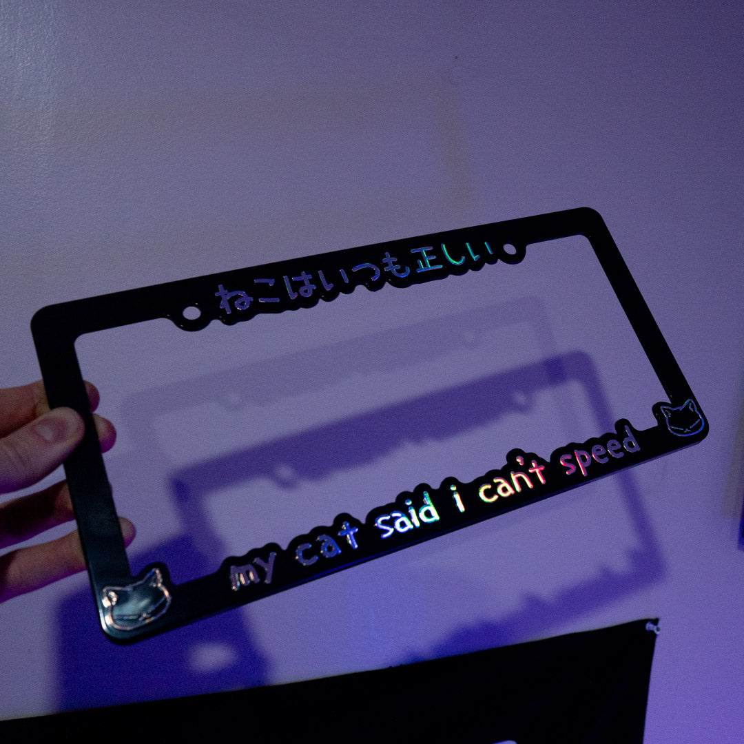 my cat said i can't speed v2.0 - license plate frame (black/oil