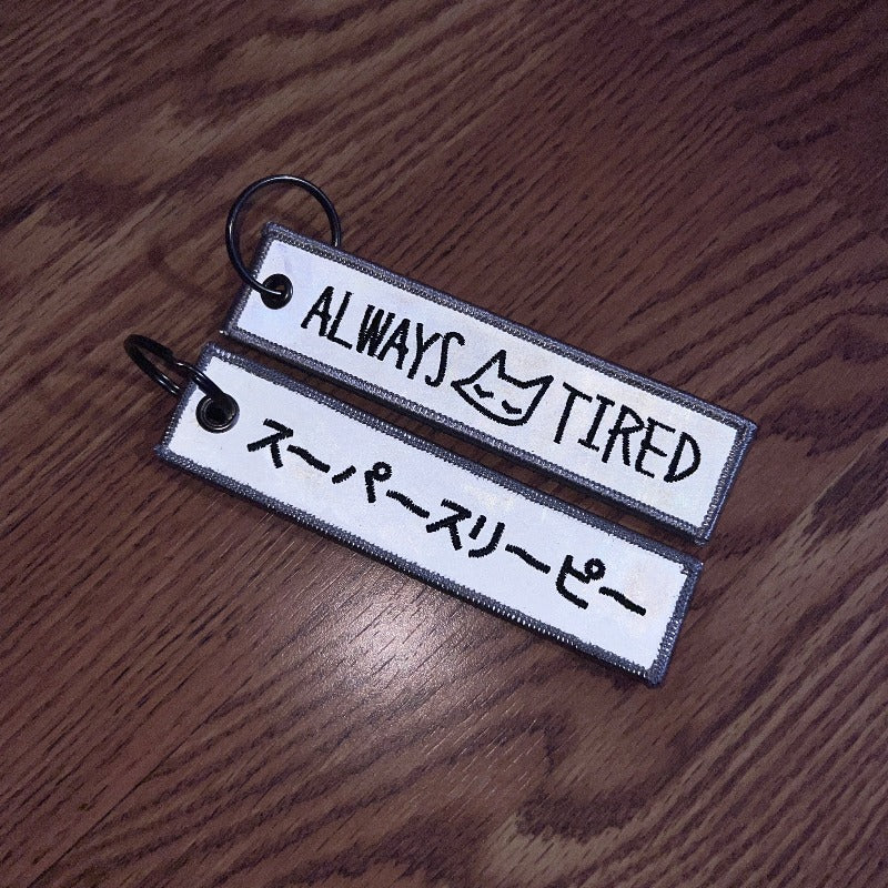 always tired ~ REFLECTIVE (flight tag) - triple cat deluxe